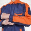 Tay áo dài phối màu cam tạo vẻ ngoài năng động và dễ nhận diện