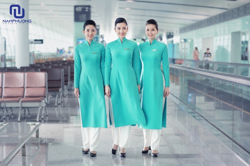 Áo dài đồng phục màu xanh ngọc dành cho tiếp viên thông thường